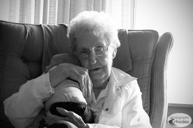 Great-grandma Lea holds Baby K in her home, at 6 weeks old.