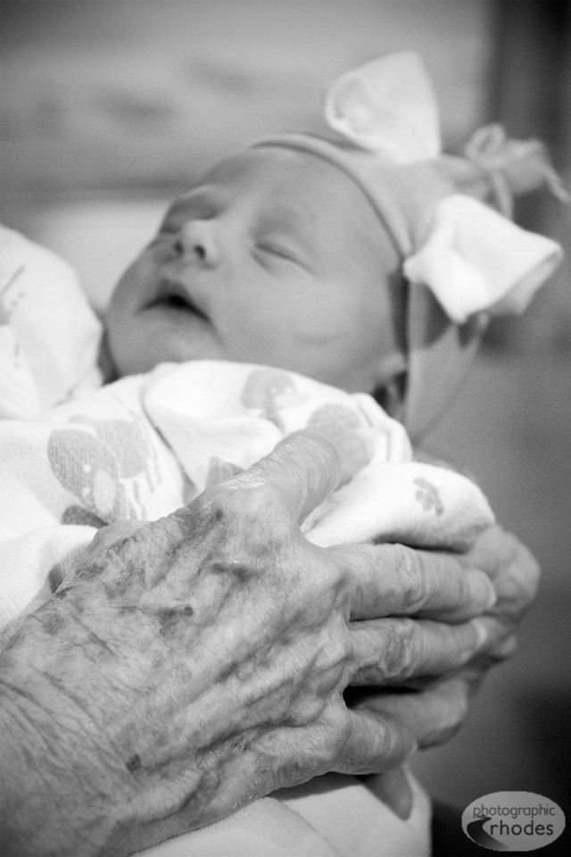Great-grandma Nadine holds Baby K in the hospital